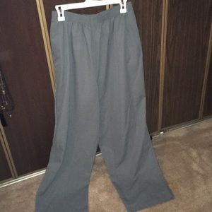 A pair of dress pants in Gray